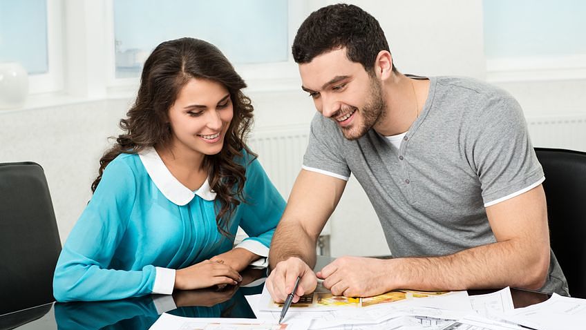 19270872 – couple is considering the future design of the apartment alternate text for this image