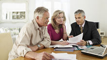 Advisor with couple alternate text for this image