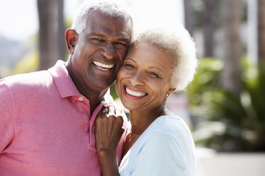 18735801 – romantic senior couple hugging in  street alternate text for this image