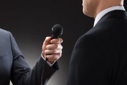 40751687 – close-up of a reporter conducting interview of businessman alternate text for this image