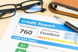 47966326 – credit score report with pen, glasses, and organizer book alternate text for this image