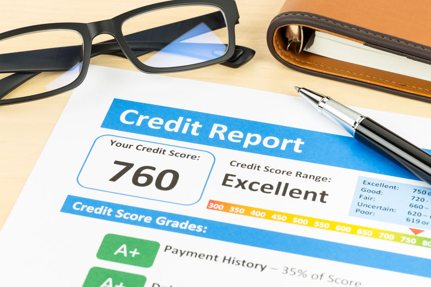 47966326 – credit score report with pen, glasses, and organizer book alternate text for this image