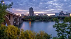 62441869 – saskatoon skyline at night along the saskatchewan river. alternate text for this image