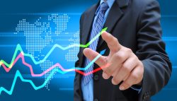 23129075 – businessman hand pushing a business graph alternate text for this image