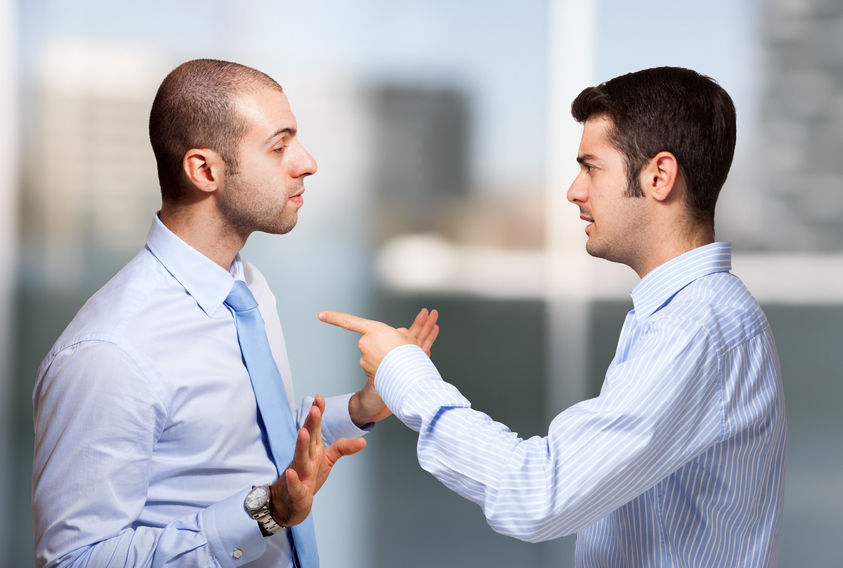 41808418 – businessman scolding a colleague alternate text for this image