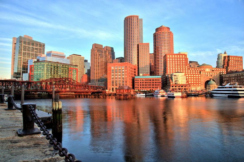 32980993 – boston skyline with financial district and boston harbor at sunrise alternate text for this image