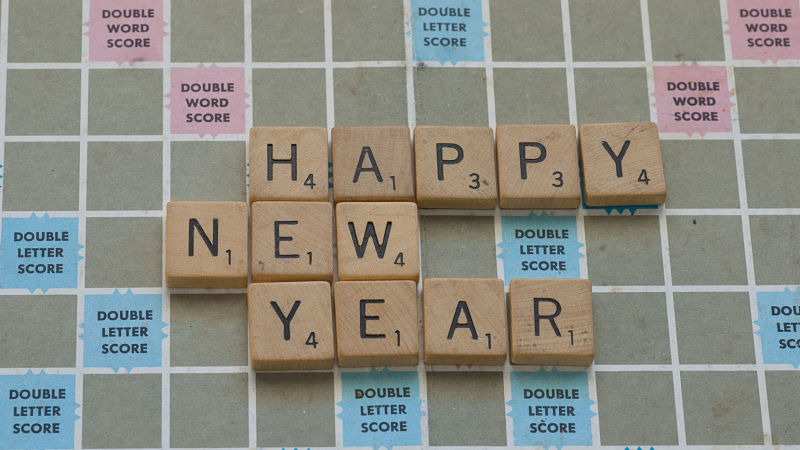 35158748 – happy new year spelled out on scrabble board alternate text for this image