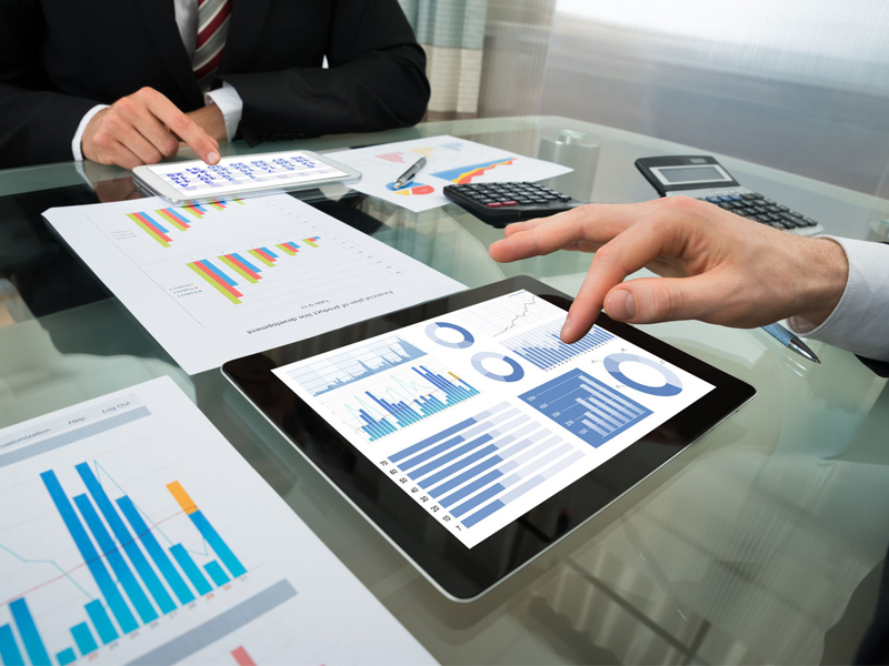 portfolio-800x600_Two-Businessman-Analyzing-Graph-On-Digital-Tablet_41073725 alternate text for this image