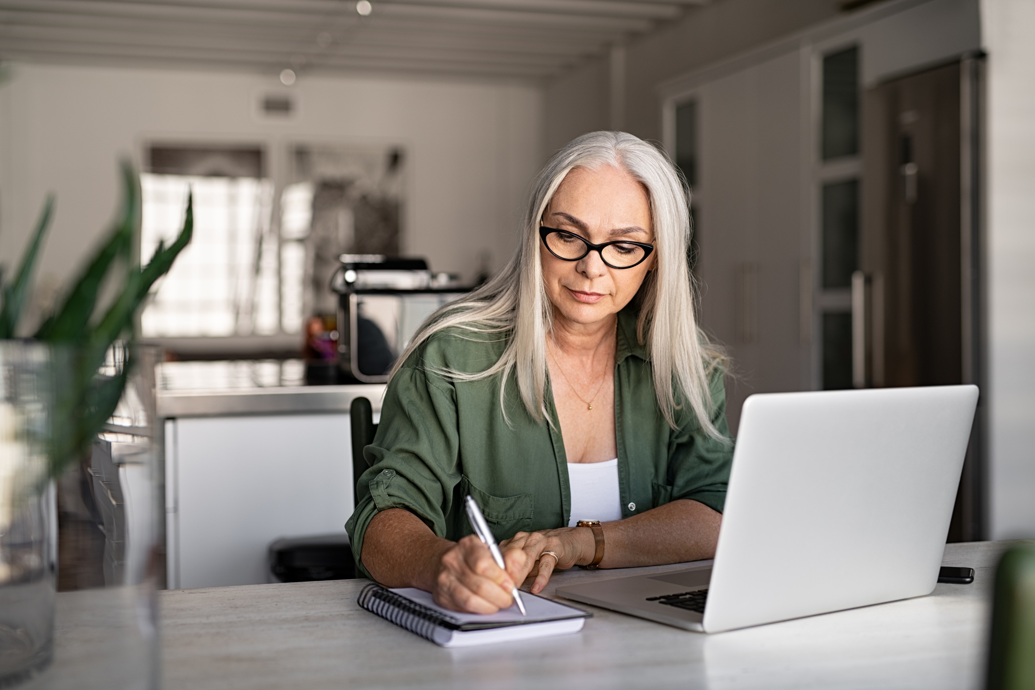 woman sitting at laptop
