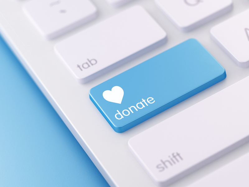 Modern White Keyboard wih Donate Buttons alternate text for this image