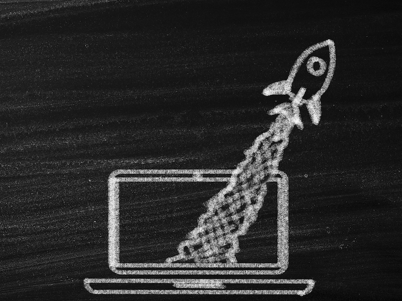 Rocket Taking off from Computer Laptop alternate text for this image