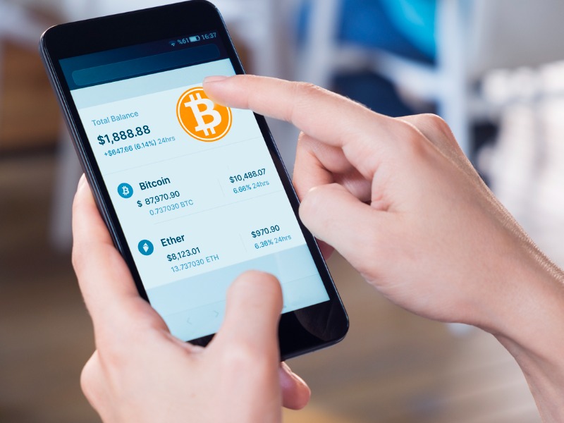 bitcoin-crypto-currency-wallet-on-a-mobile-phone-picture-id1303397527 alternate text for this image