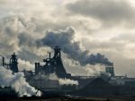 Lots of smoking chimneys in a dark environment