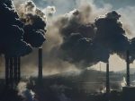 Smoke stacks spewing dark smoke