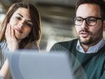 Couple reviewing portfolio