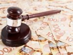 Gavel and Money - Canada stock photo
