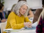 Senior Woman Studying alternate text for this image