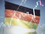 Double exposure of abstract creative financial chart hologram on German flag and blue sky background, research and strategy concept alternate text for this image