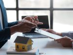 Real estate agent talking to a client